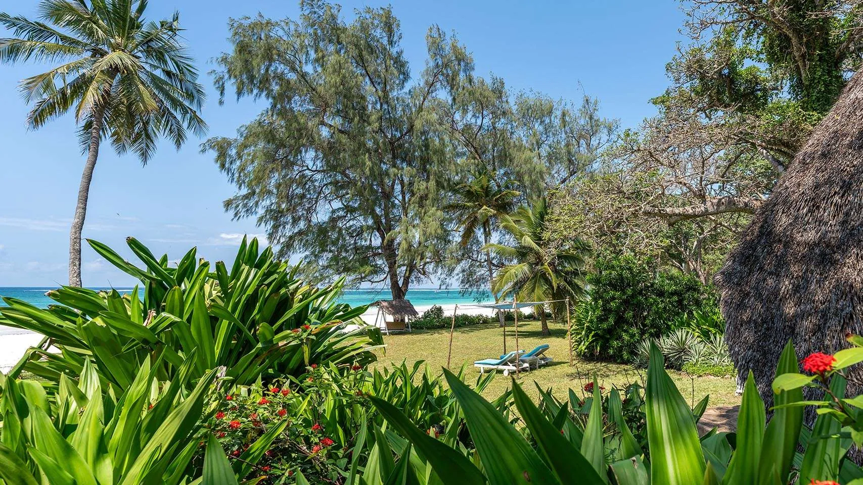 Beach banda and tropical gardens at The Sands at Nomad on Diani Beach