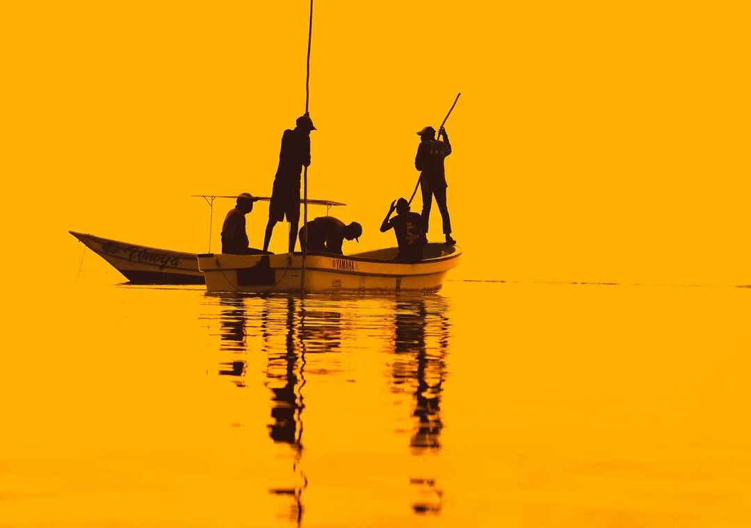 Fishermen at indian ocean DIani beach