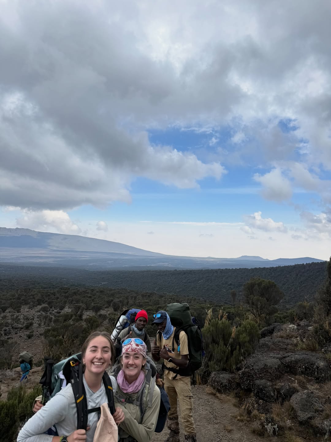 WAE guests and local mountain crew climbing together on Mount Kilimanjaro