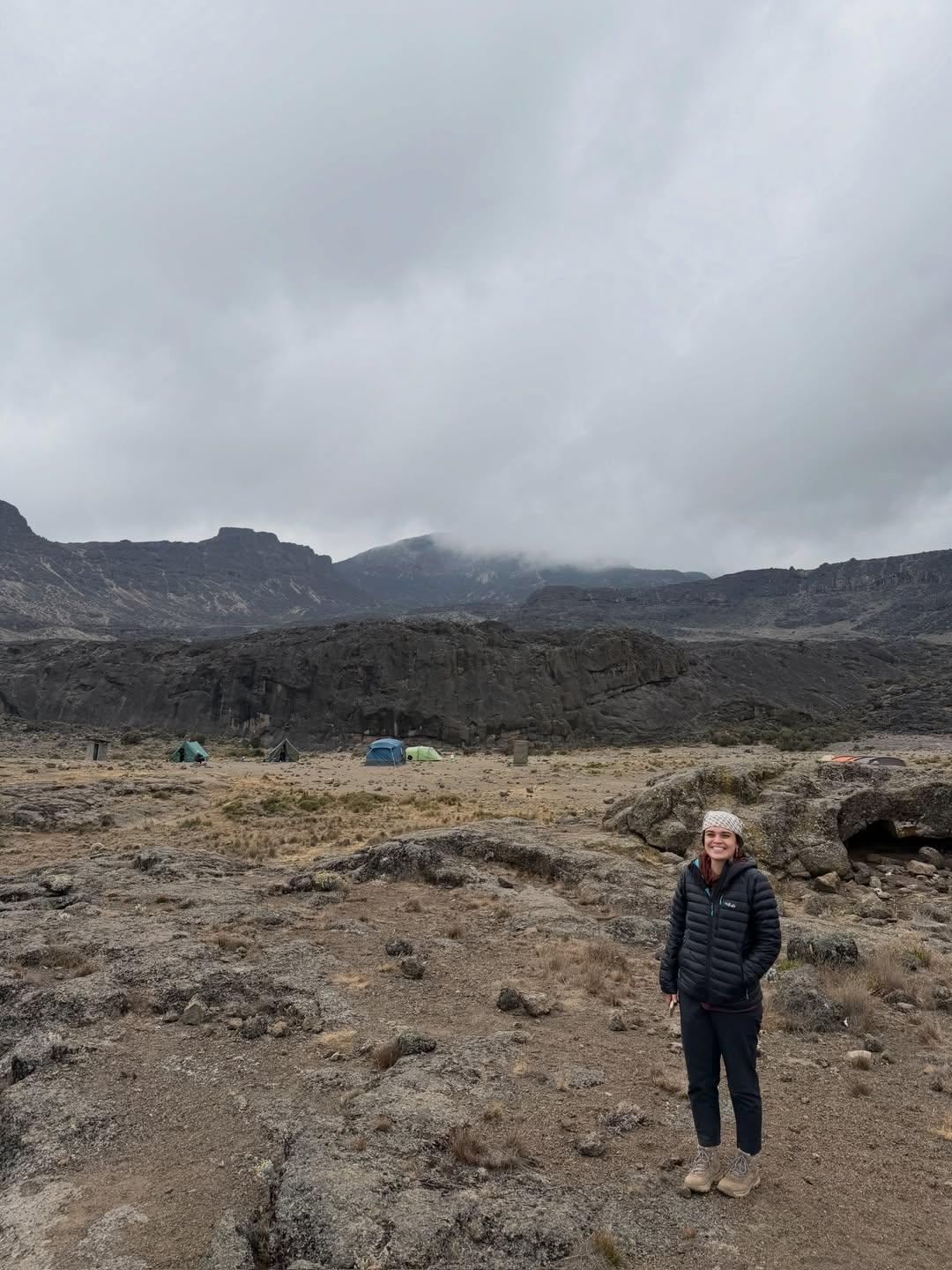 A WAE guest beside a high Kilimanjaro camp in the alpine zone