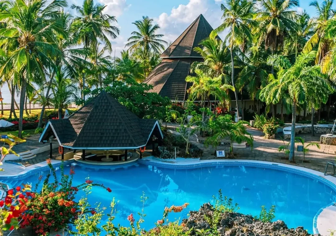 Tropical resort gardens and swimming pool on the Kenyan coast