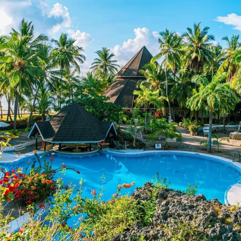 Tropical resort gardens and swimming pool on the Kenyan coast