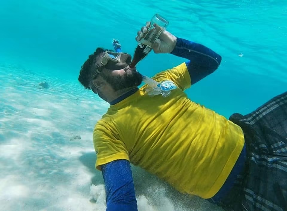 Fathy Shipa snorkelling beneath the clear water of the Kenyan coast