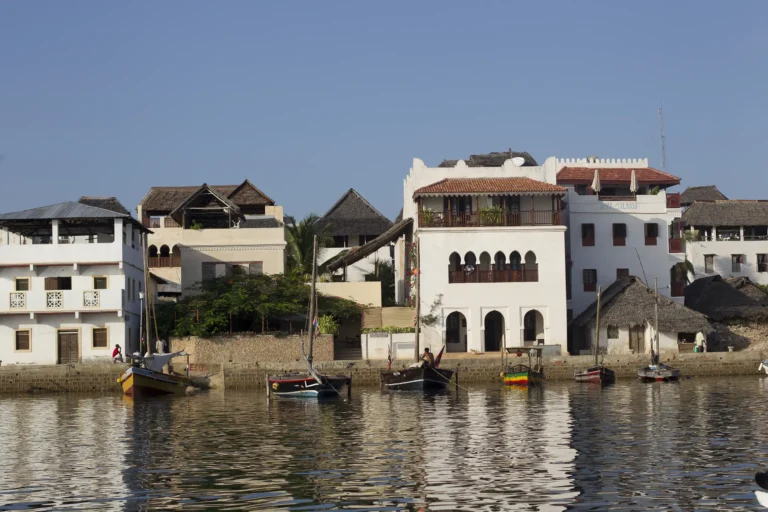 Lamu House on the seafront of Lamu Old Town with dhows in the channel