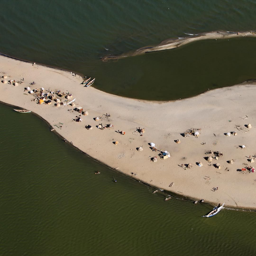 El Molo settlement and fishing boats on a narrow sandbar beside Lake Turkana near Loiyangalani