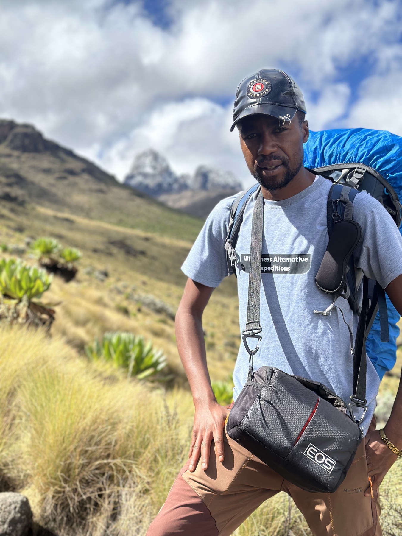 Joseph Kimani carrying an expedition pack on Mount Kenya