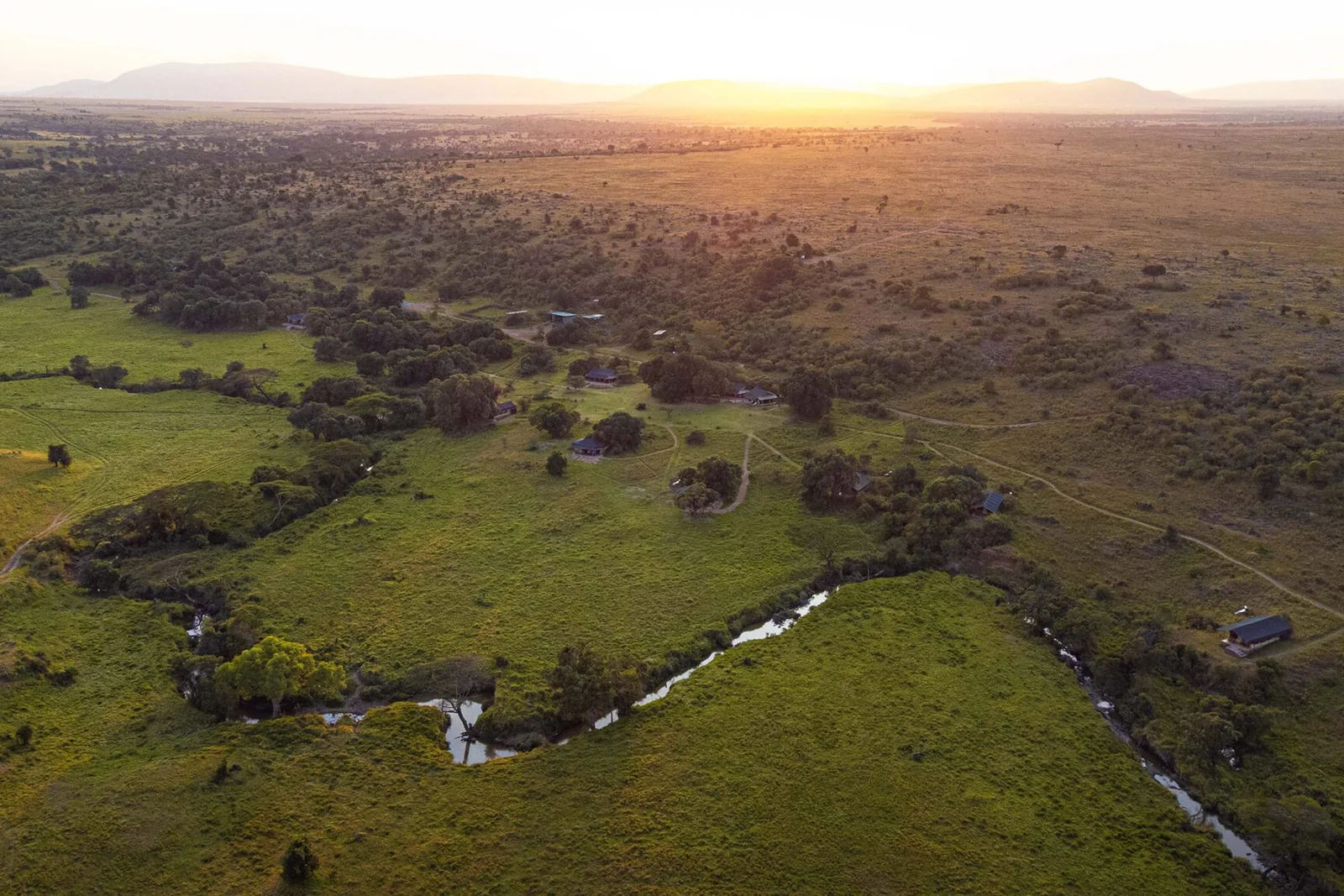 Kicheche Mara North set beside a seasonal stream in Mara North Conservancy.