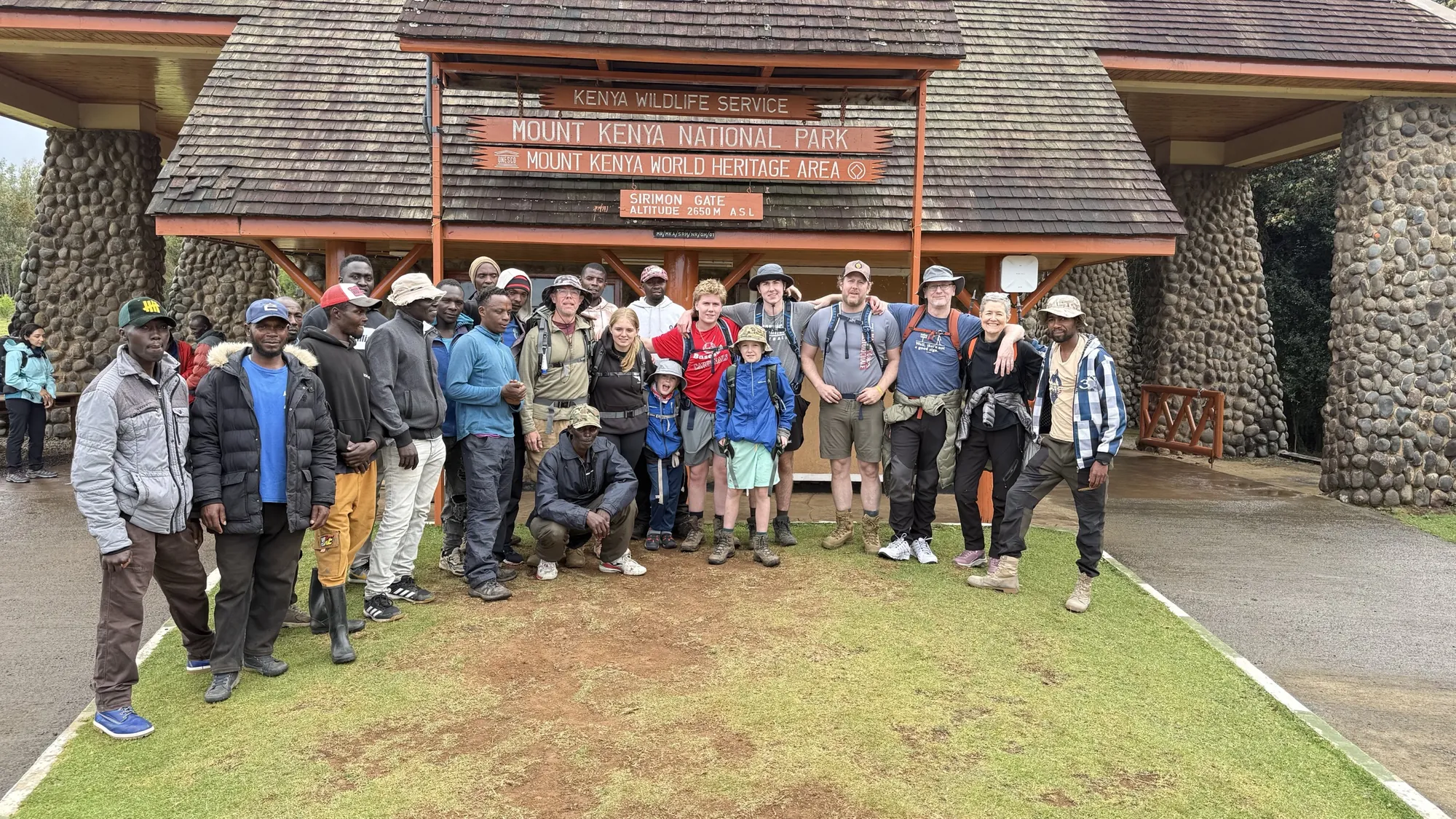 Guests and the Wilderness Alternative mountain crew at Sirimon Gate, Mount Kenya