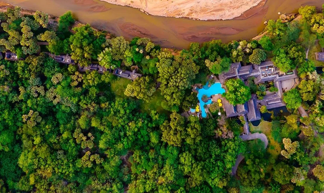 Aerial view of Sarova Shaba Game Lodge beside the Ewaso Nyiro River in Shaba National Reserve.