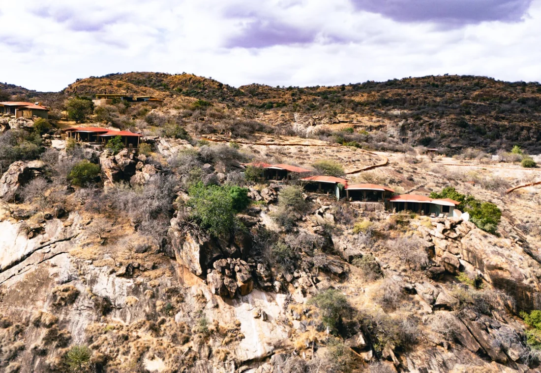 Aerial view of Saruni Samburu built into a rocky ridge above Kalama Conservancy.