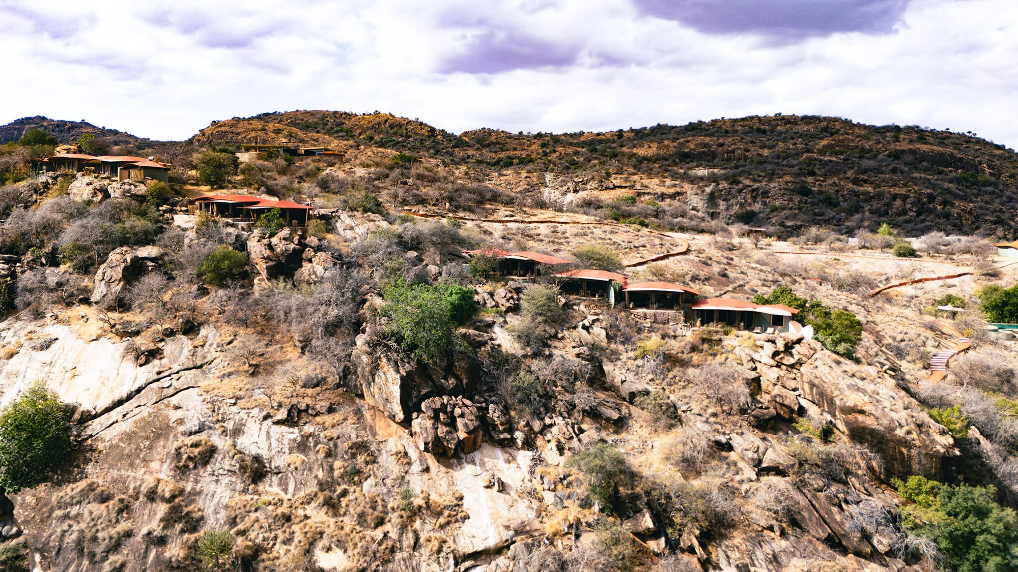 Aerial view of Saruni Samburu built into a rocky ridge above Kalama Conservancy.